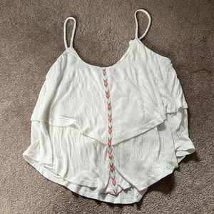 White layered top with chevron detail